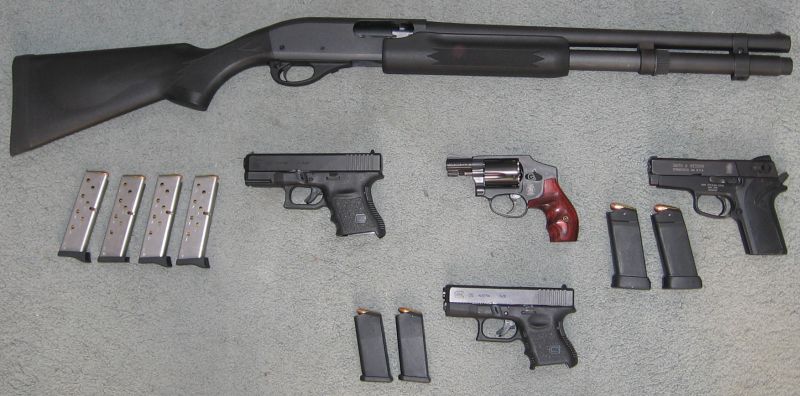 pictures of 9mm guns.  908 9mm 8+1 pistol and Glock 26 9mm 10+1 pistol. the-black-guns.jpg